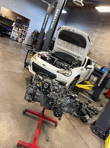 Subaru engine removed for repair at Auto Care Experts in Gilbert, AZ